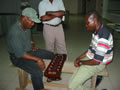 Ibrahim Abubakar playing previous International Oware Champion Trevor Simon