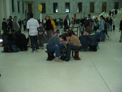 Oware being played in the main foyer of the British Museum