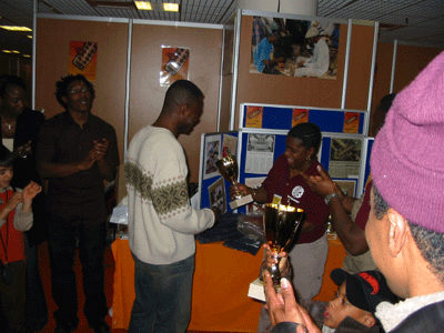 Kofi Asante receiving his prize for placing 2nd.
