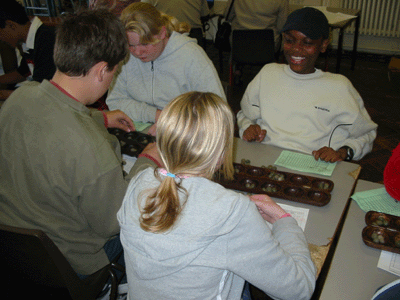 Crofton Park team member in a match with Chesham player