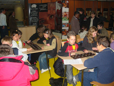 Children playing Oware