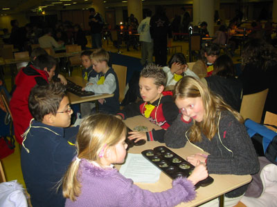 Children playing Oware