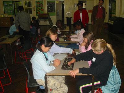 Players have a game whilst parents watch on.