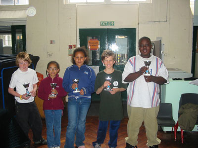 Group picture of the Gayhurst Primary School  Team 2 receiving with their cups.