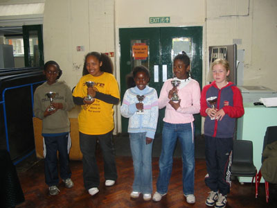 Group picture of the Gayhurst Primary School  Team 1 receiving with their cups.