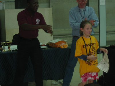 Maguerite Frisby receiving her certificate of participation.